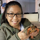 Christine Ambre with a turtle