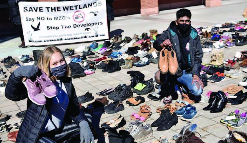 Ally Zaheer and Devin Mathura shoe protest