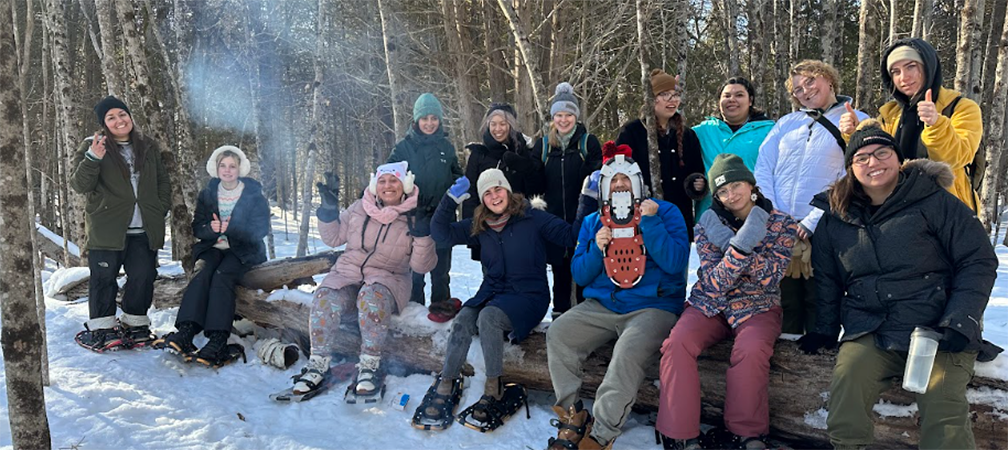 Snowshoeing at Camp Kawartha Outdoor Centre at the 2024 YCME Winter Retreat